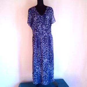 Woman within .dress blue and lite blue flowers with blue underlining